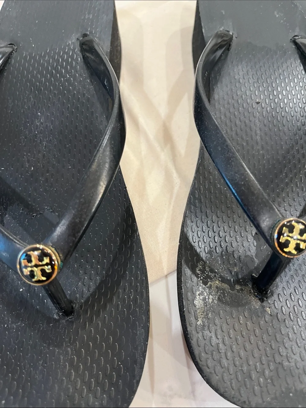 Tory Burch Black Flip-Flop Sandals with Gold Logo Discs
